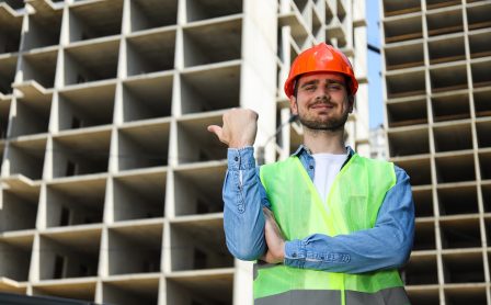 Young man civil engineer in safety hat